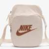 Сумка на плече Nike NK HERITAGE CROSSBODY - MTLC M 4L бежевий Уні 18x7,5x23 см DT-FB3041-838, прев. 1